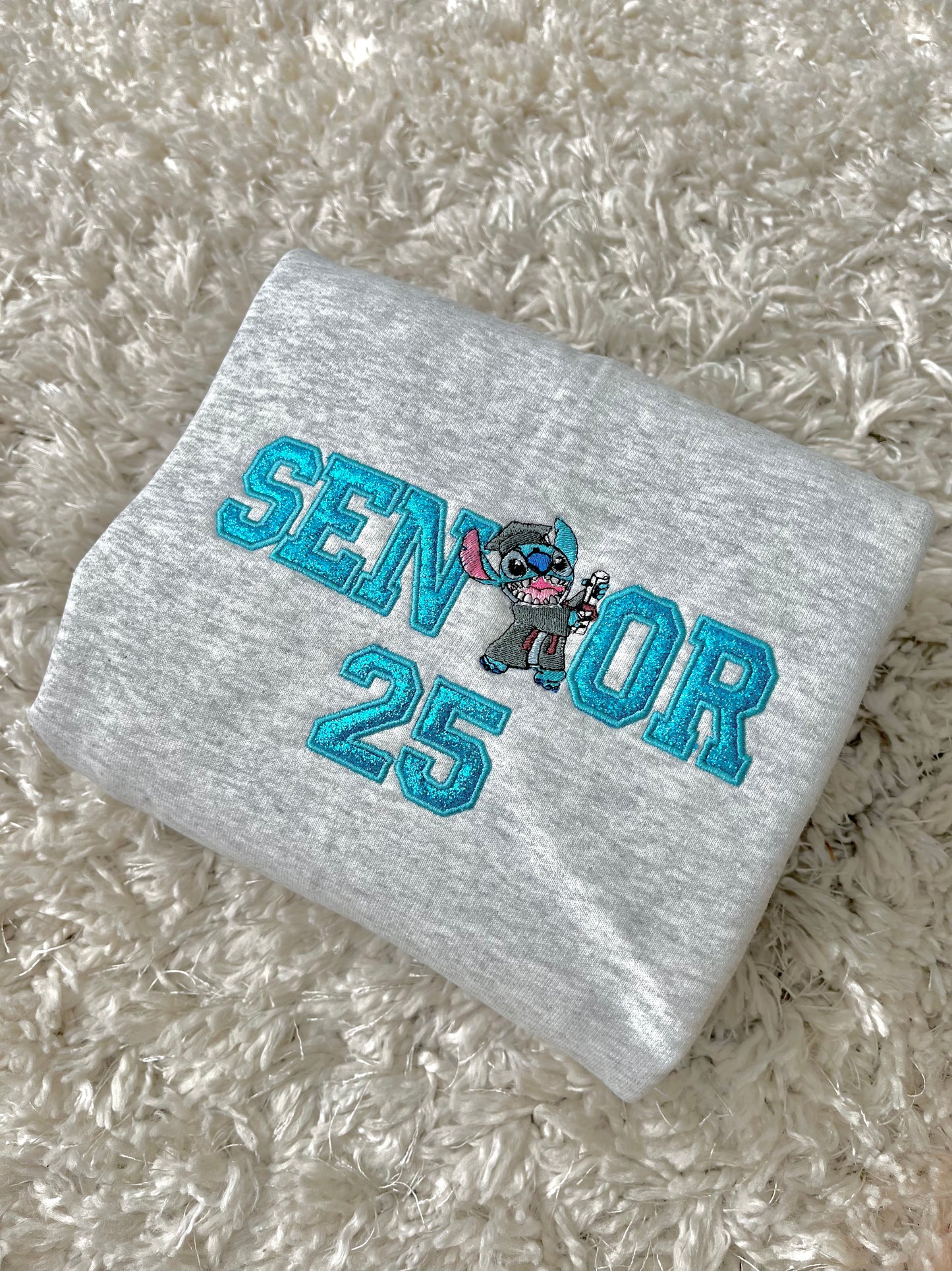 Stitch 25’ Grad Sweatshirt