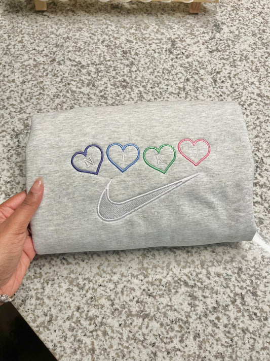 Candy heart’s swoosh sweatshirt